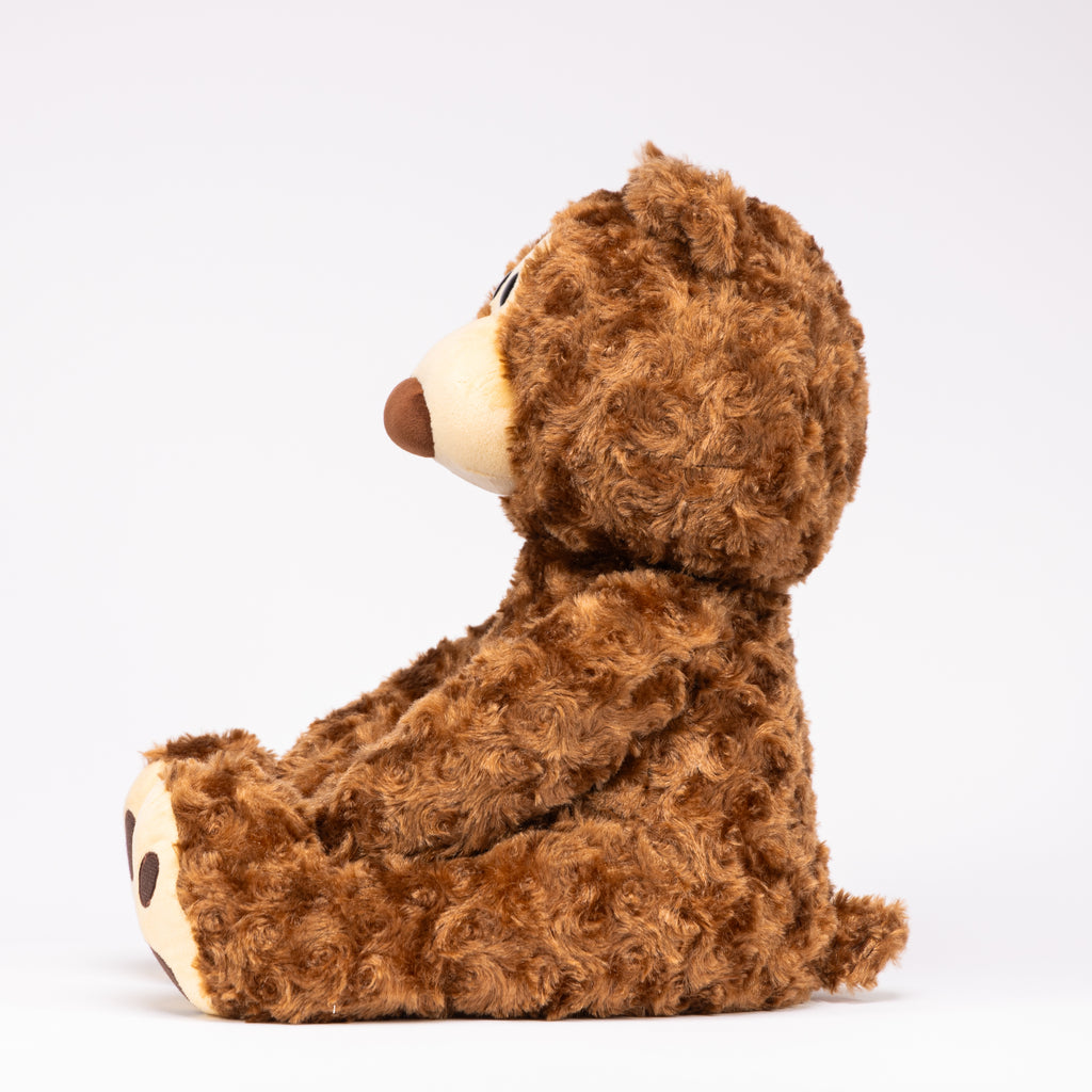 Bear expertly weighted to provide gentle pressure, promoting relaxation and reducing anxiety for both children and adults alike. Side