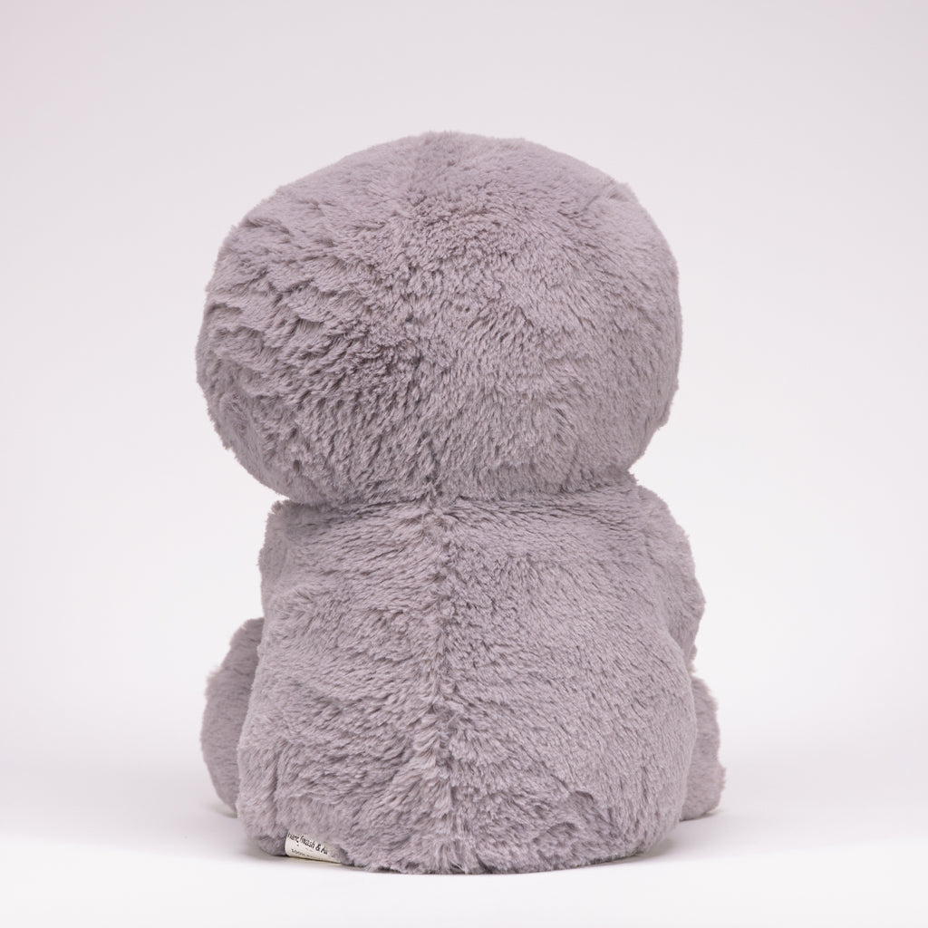 Tranquil Sloth on a white studio background, showcasing its plush gray fabric and serene expression.